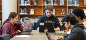 Students in the library focused on work