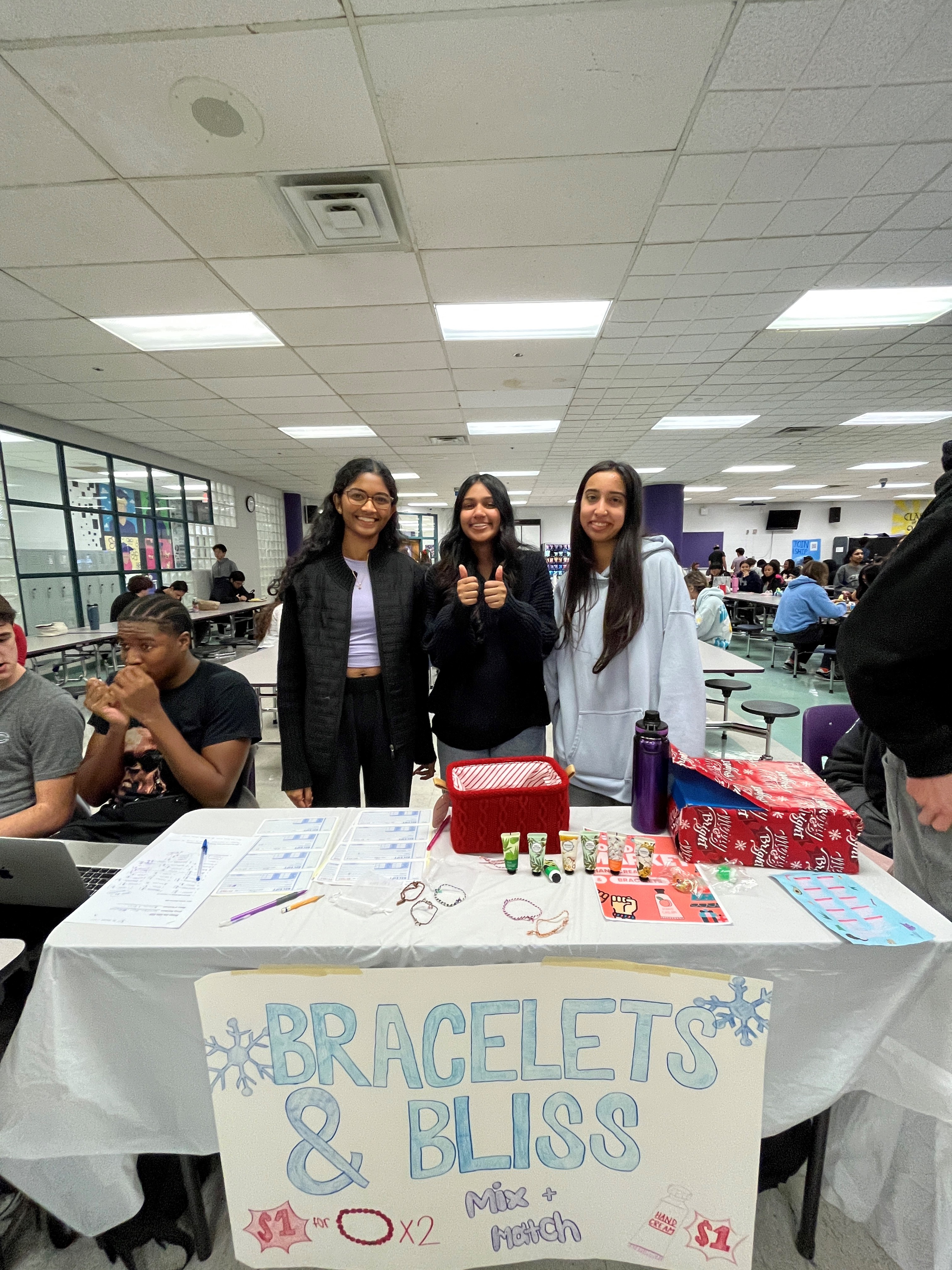 two students at market day table in cafeteria