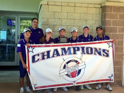photo of the golf team with the district championship banner
